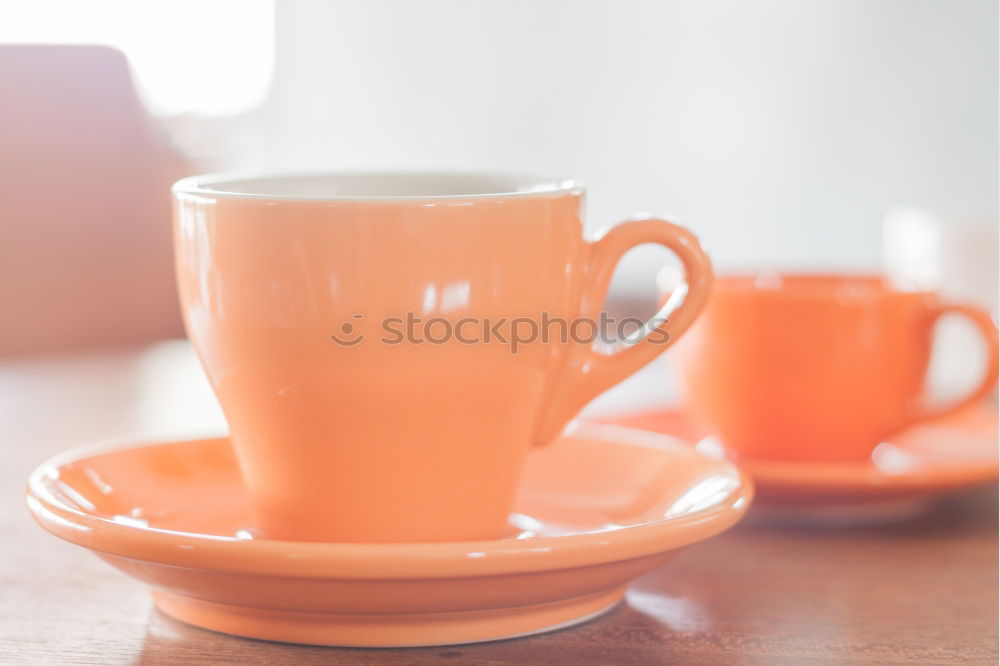 Similar – Image, Stock Photo Coffee cup and saucer with gold decoration stand on a wooden table