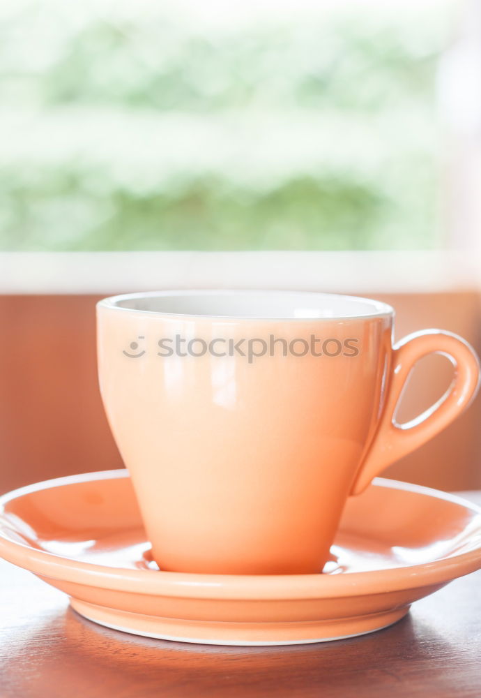 Similar – Image, Stock Photo Coffee cup and saucer with gold decoration stand on a wooden table