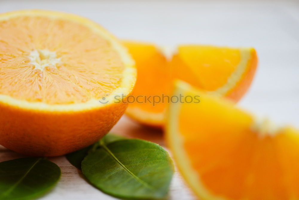 Similar – Image, Stock Photo Cut orange with green leaves