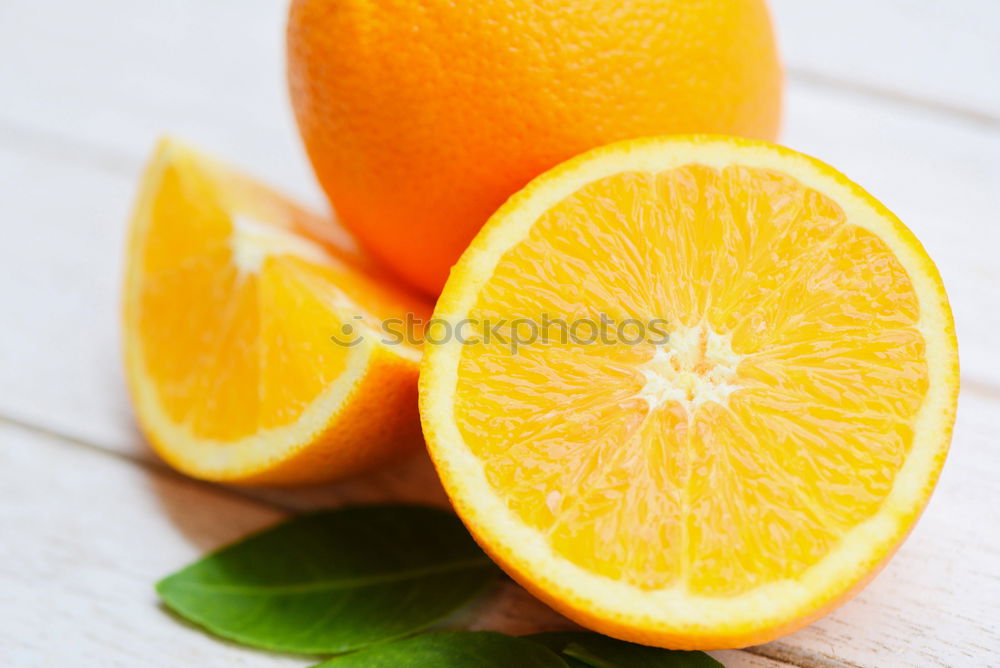 Similar – Image, Stock Photo Cut orange with green leaves