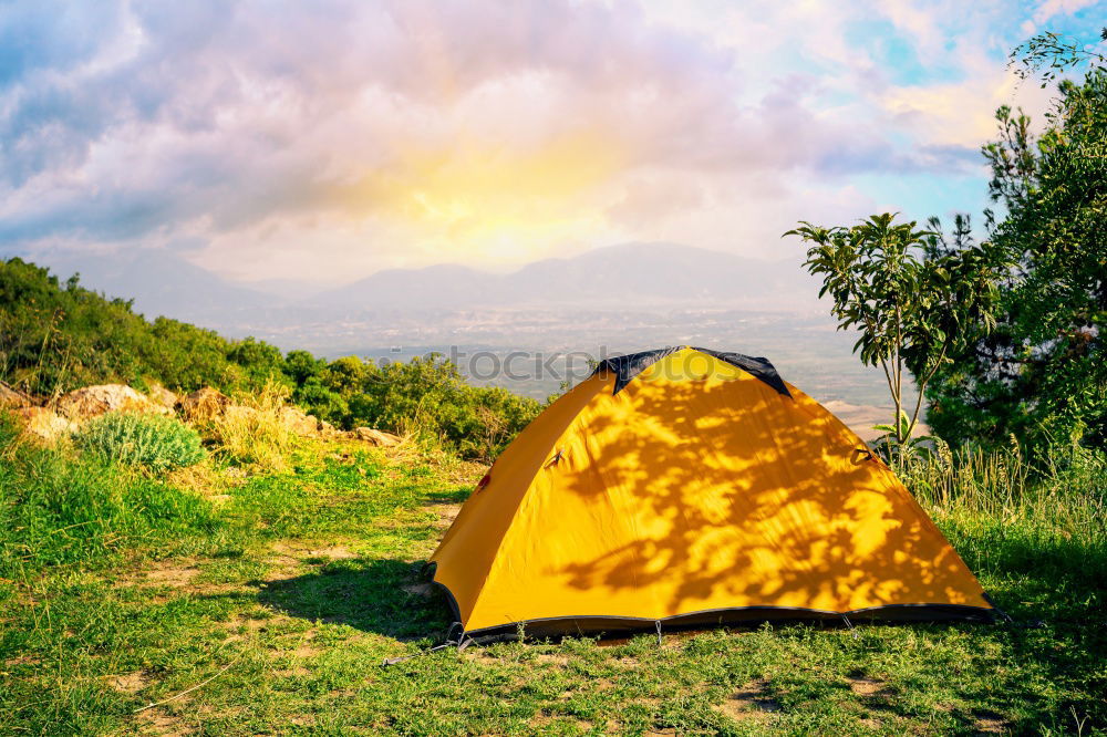 Similar – Tent in storm and rain in an autumn landscape