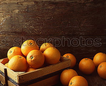 Similar – Fresh oranges in an old wooden box