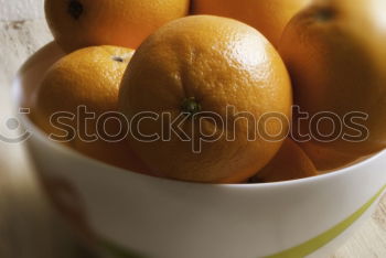 Similar – Foto Bild Eine Grapefruit auf einer rot-weiß karierten Serviette auf einem Holztisch. Farben und Firmen. Rund und eckig