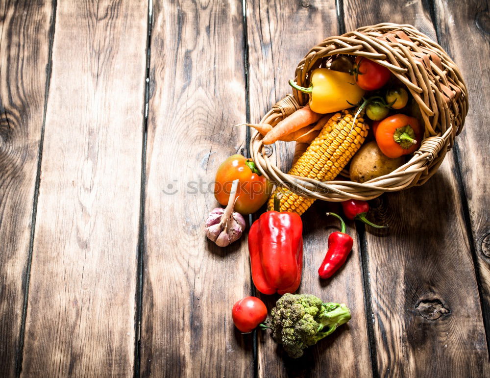 Similar – Image, Stock Photo Pumpkin and autumn vegetables on the kitchen table