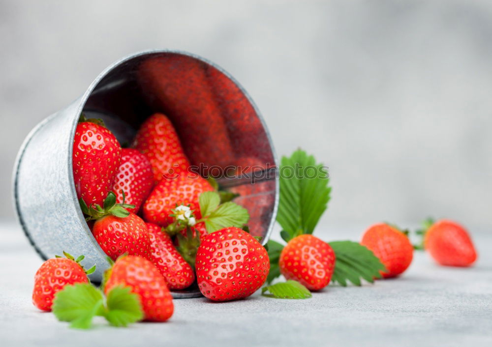 Similar – Strawberries in a bucket on a white wooden table