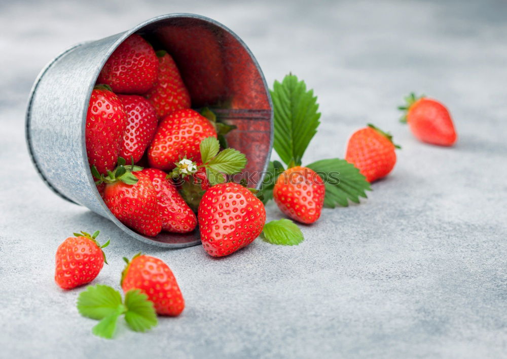 Similar – Strawberries in a bucket on a white wooden table