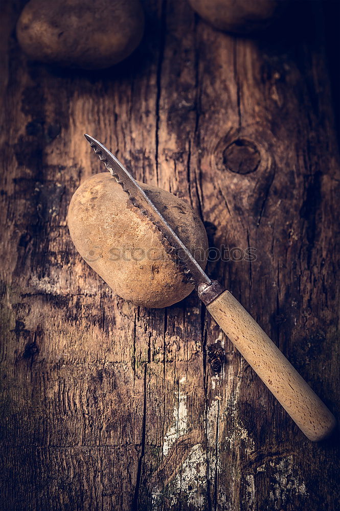 Image, Stock Photo Organic potatoes with knife on rustic wood