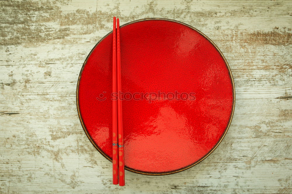 Oriental ceramic plate and chopsticks