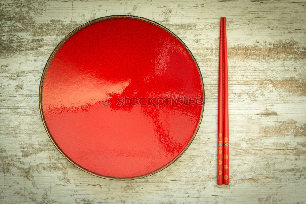 Oriental ceramic plate and chopsticks