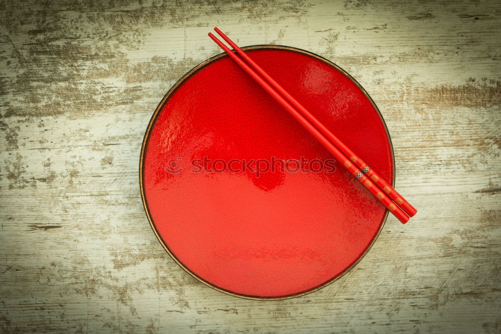 Oriental ceramic plate and chopsticks