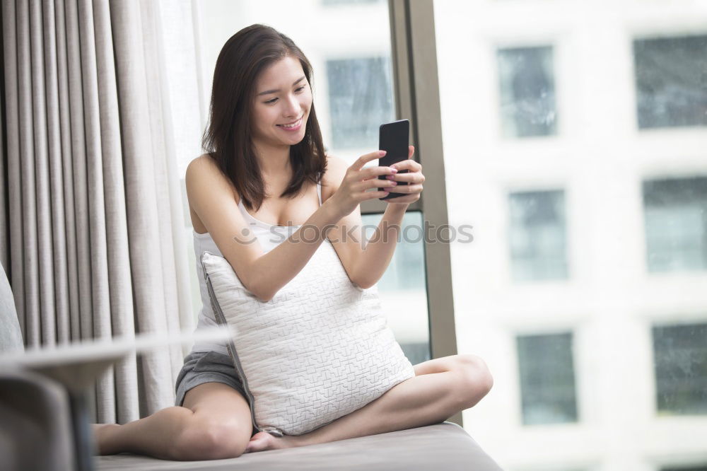 Similar – woman on bed enjoying a cup of coffee. morning