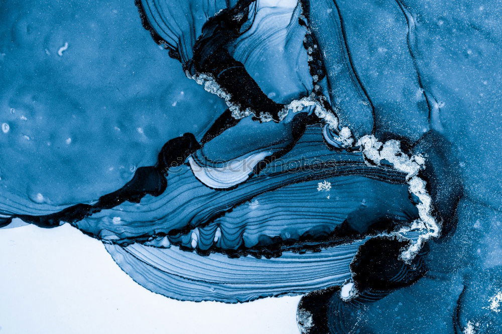 Similar – Filigree ice flower on the windscreen of a car during severe frost