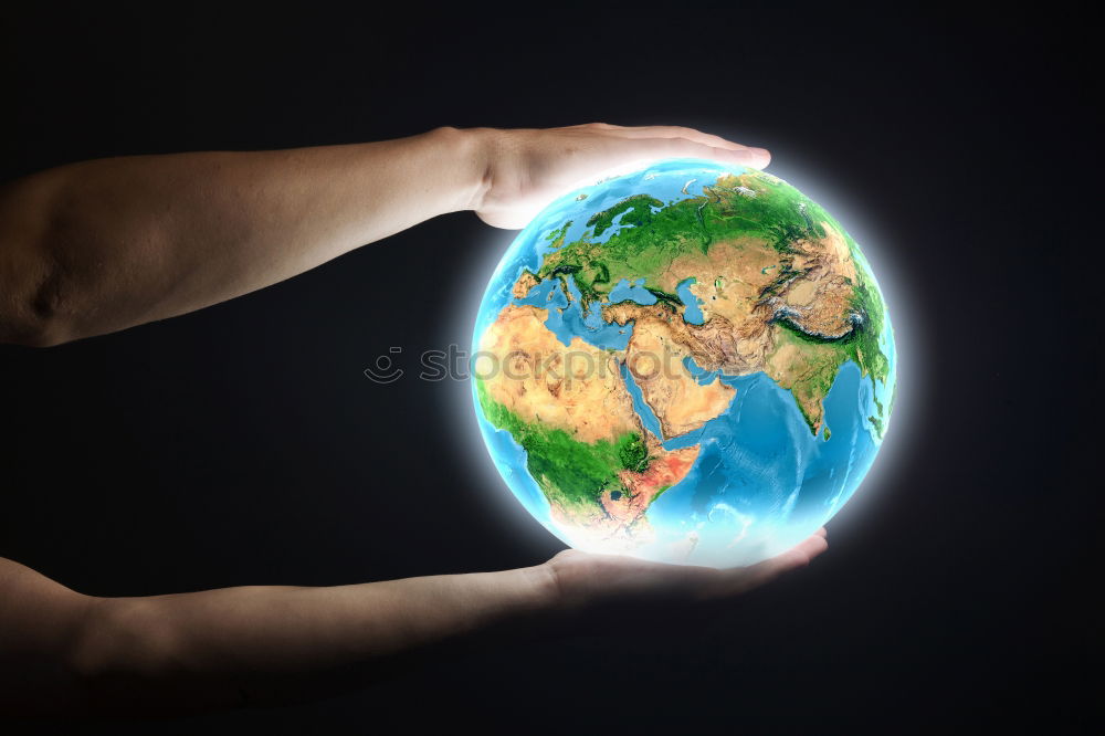 Similar – Woman holding a globe in her hand