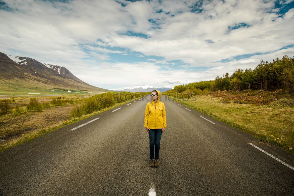 Similar – Image, Stock Photo jumping woman on a country road with mountains in the background