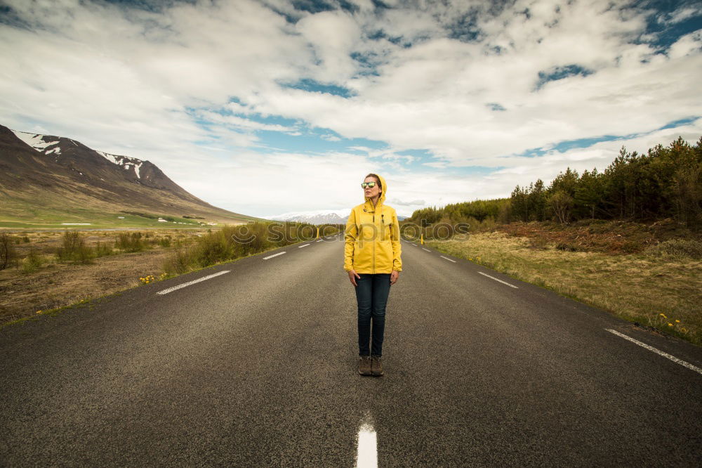 Similar – Image, Stock Photo jumping woman on a country road with mountains in the background