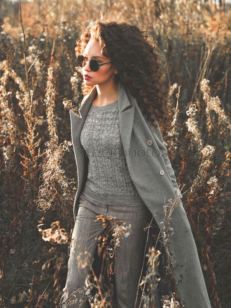 Similar – A Young Woman Standing in the Woods