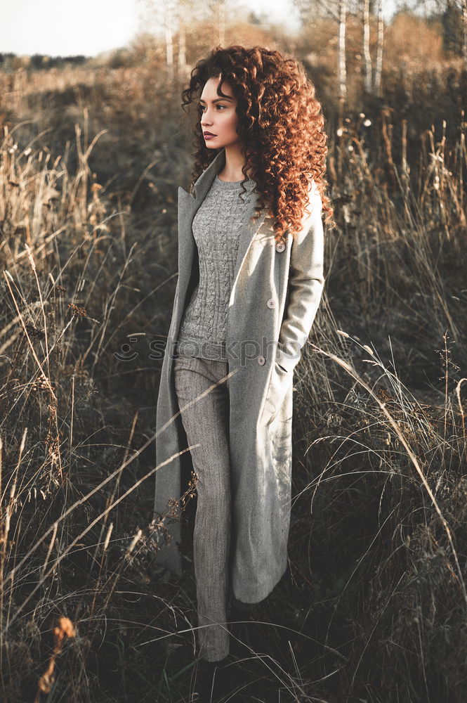 Image, Stock Photo Young redhead woman enjoying the sunset outdoors