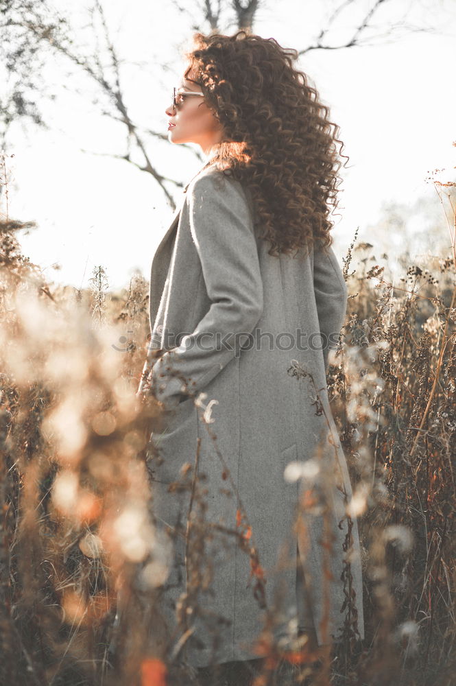 Similar – Woman posing in forest