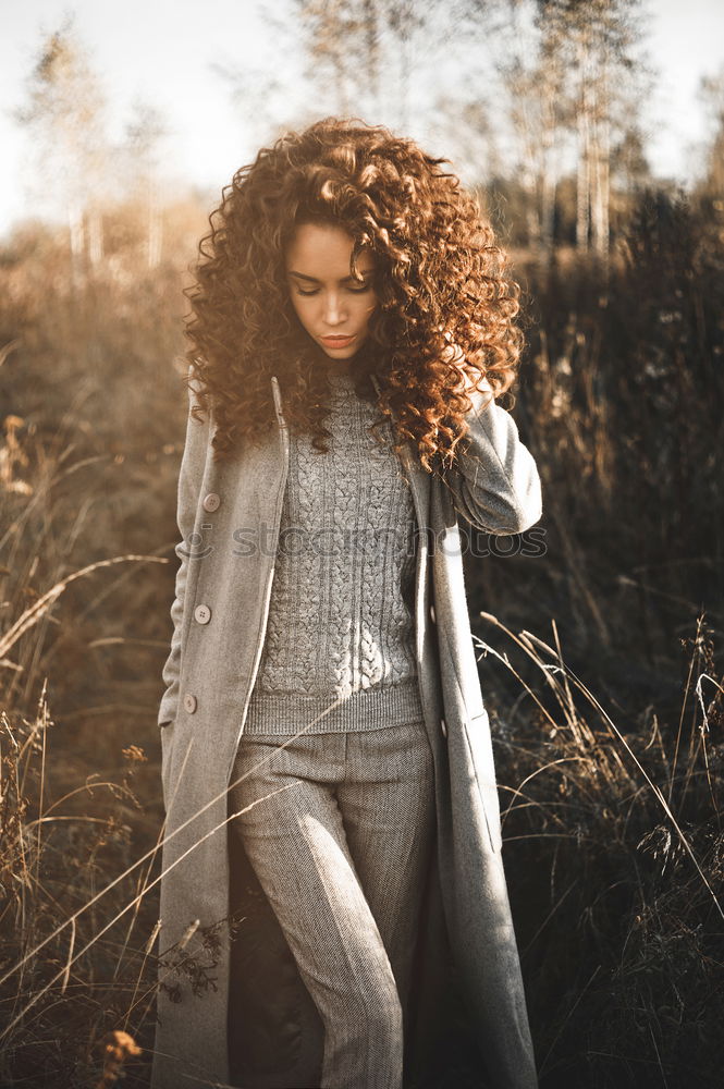 Similar – Foto Bild Frau mit Rock und Bluse greift sich in Haare