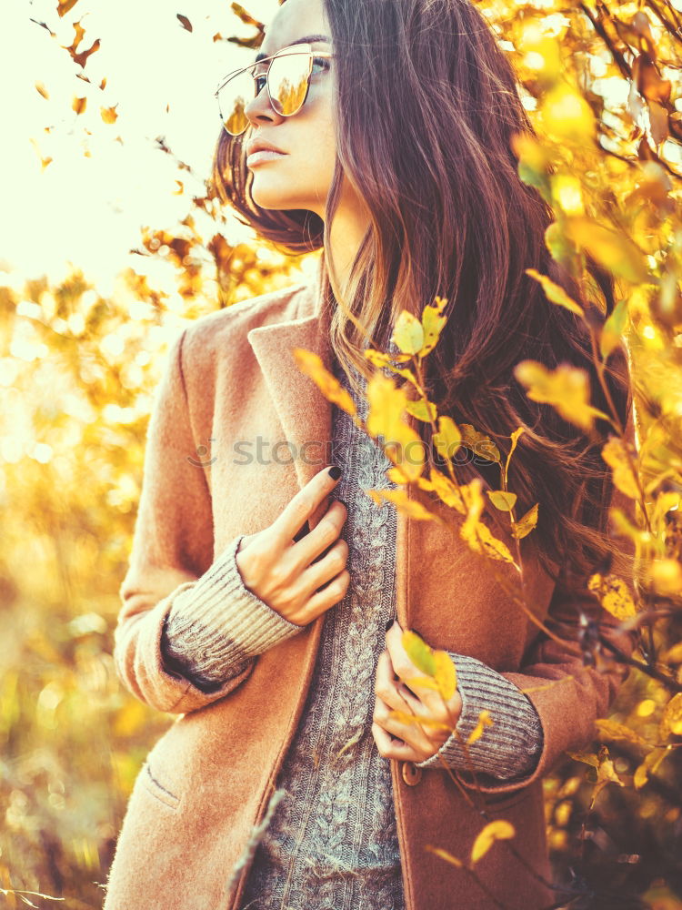 young pregnant woman walking in autumn