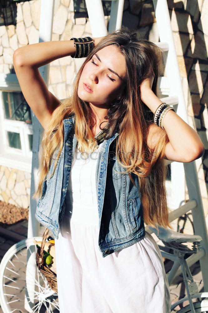 Similar – Happy girl posing on the stones of a river