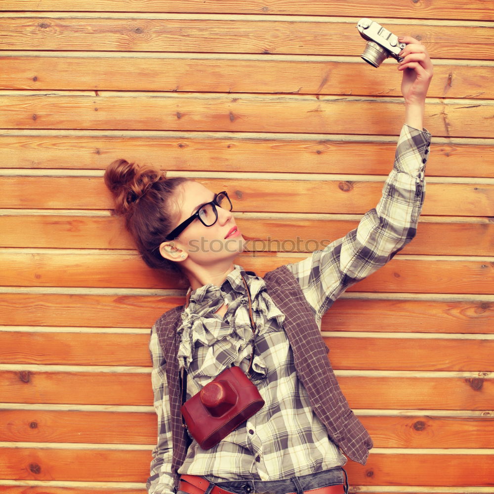 Similar – Young Arab woman listening to music with earphones outdoors