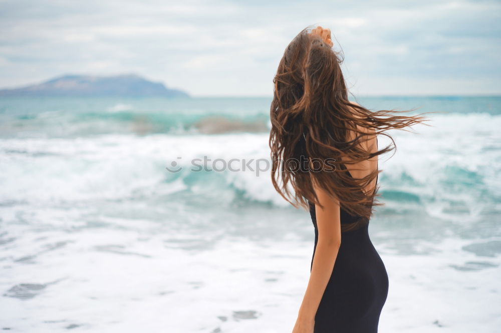 Similar – Image, Stock Photo Young naked woman holding man hand on shore near water