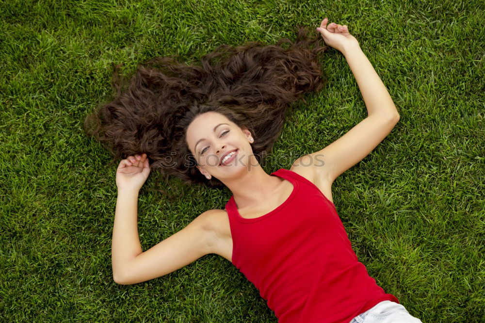 Similar – Image, Stock Photo young cheerful woman lying down on the grass