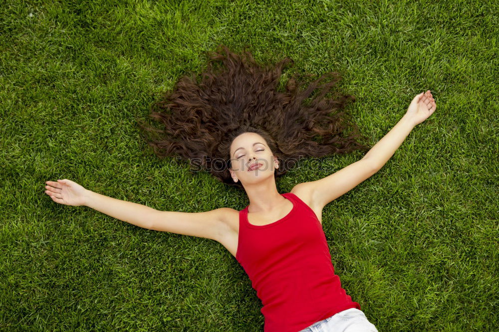 Similar – Image, Stock Photo young cheerful woman lying down on the grass