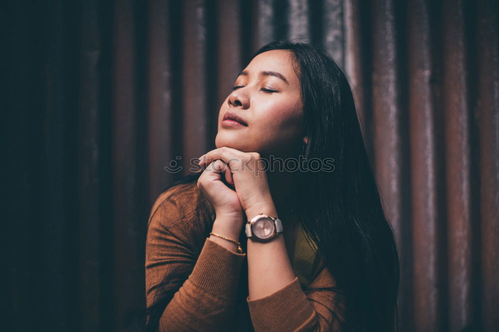 Similar – Young girl sitting on the floor and smoke