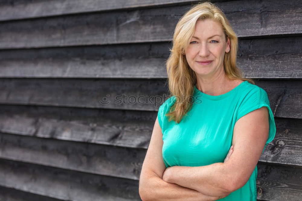 Similar – Middle Aged Woman Smiling Outdoors Portrait