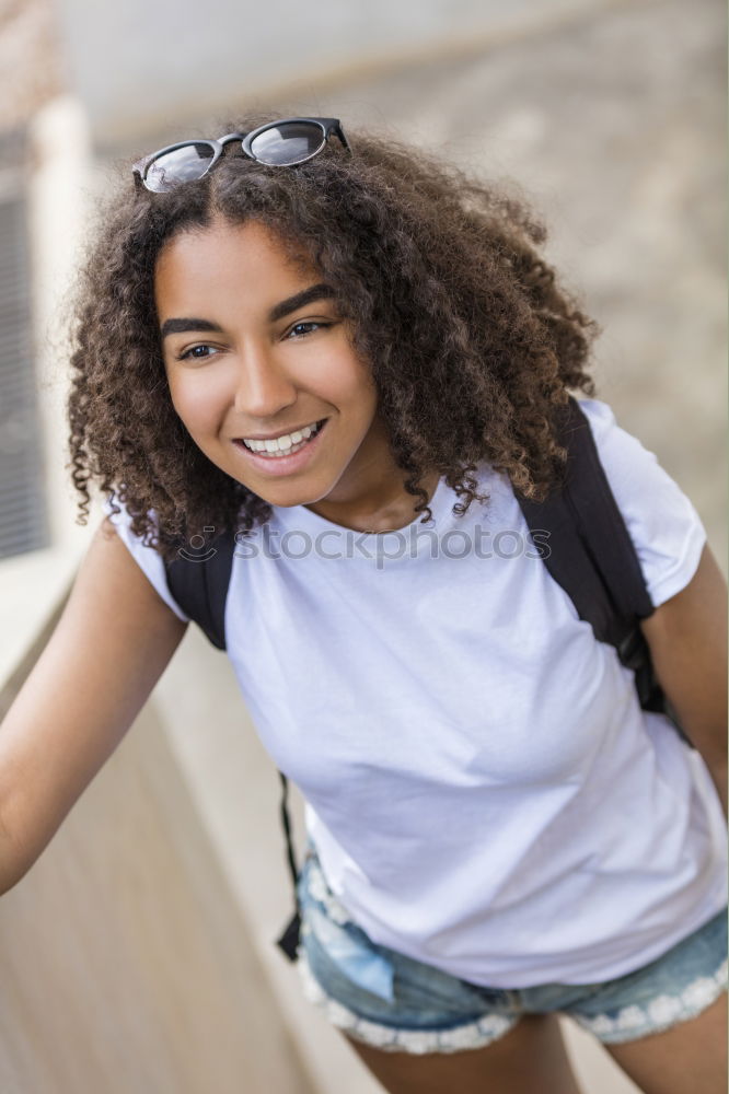 Similar – Young black woman, afro hairstyle, smiling.