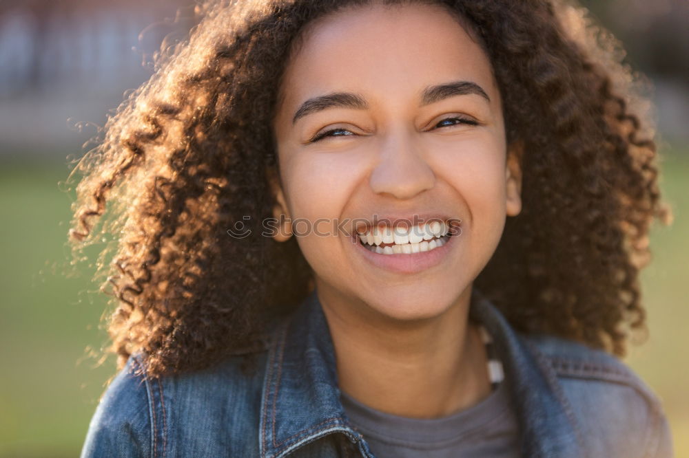 Similar – Young black woman, afro hairstyle, smiling.