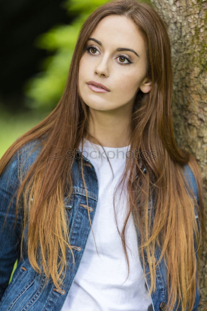 Similar – Image, Stock Photo Portrait of young woman smiling in urban background