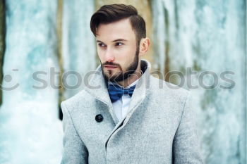 Similar – Youn trendy man looking at camera