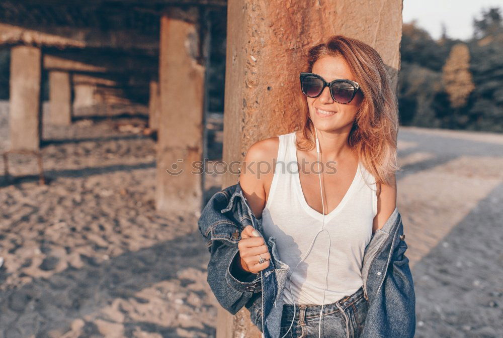 Similar – Happy girl posing on the stones of a river