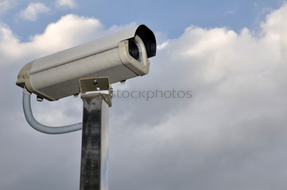 Similar – Industrial Security CCTV Camera installed on metal fence. The camera protects the industrial ground. Blue sky is on the background.