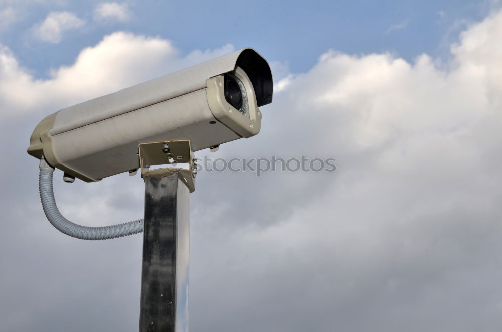 Similar – Industrial Security CCTV Camera installed on metal fence. The camera protects the industrial ground. Blue sky is on the background.