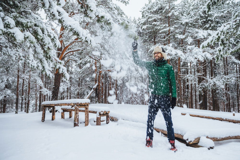 Similar – Image, Stock Photo Cheerful woman having fun in winter forest