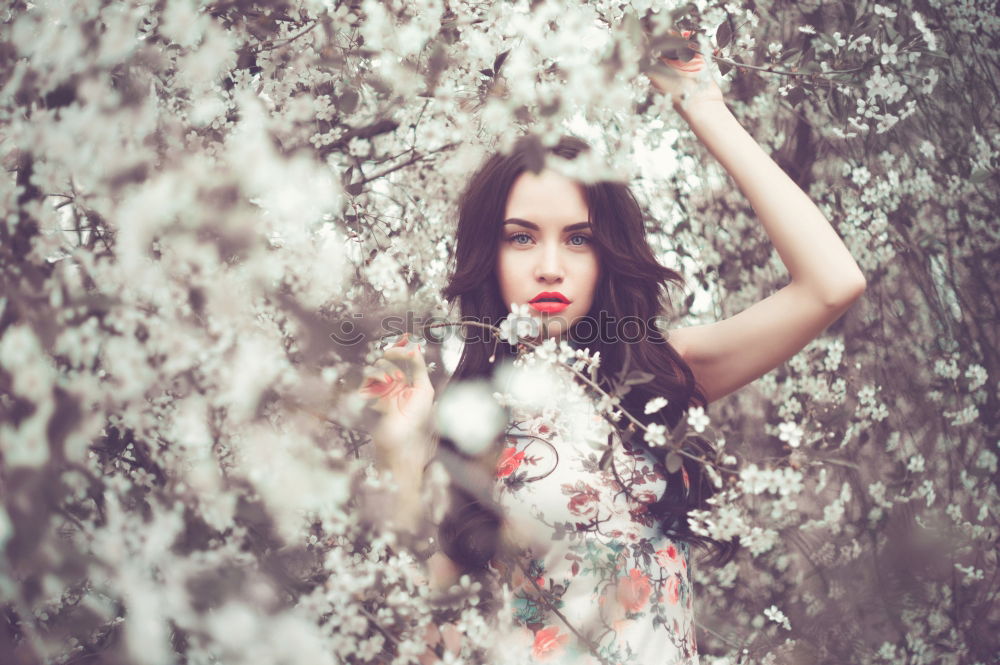 Similar – Image, Stock Photo Young redhead woman surrounded by flowers