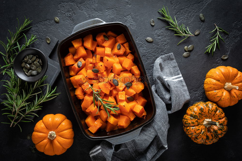 Similar – Cut into round slices of a big fresh carrots