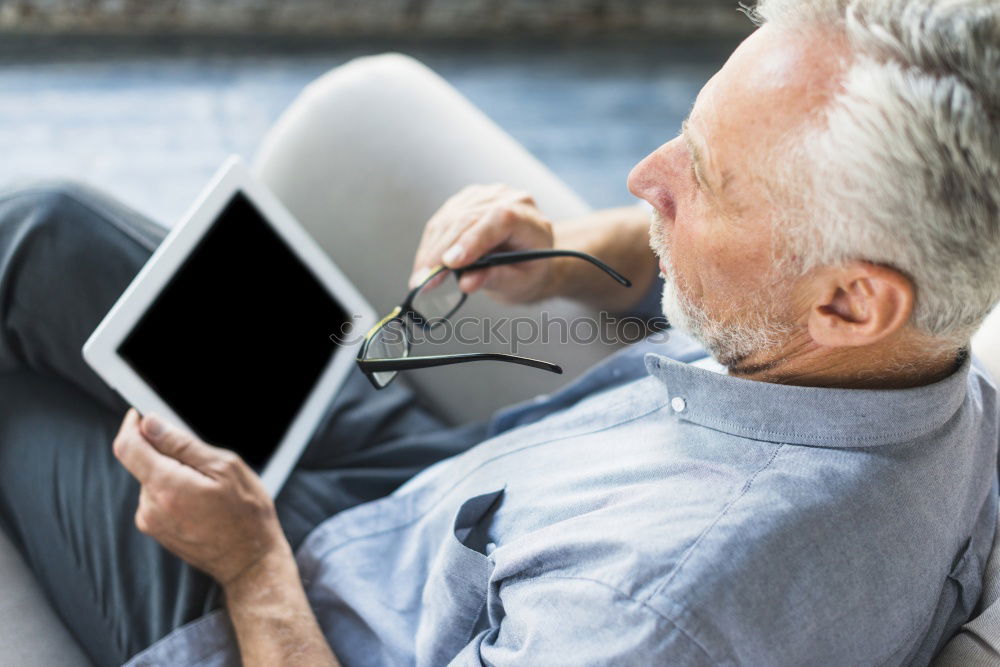 Similar – Senior citizen with smartphone