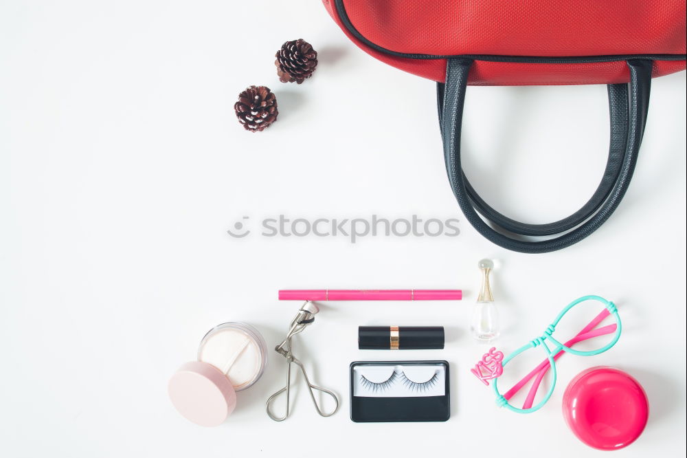 Similar – Image, Stock Photo Red and white things pulled out of red handbag