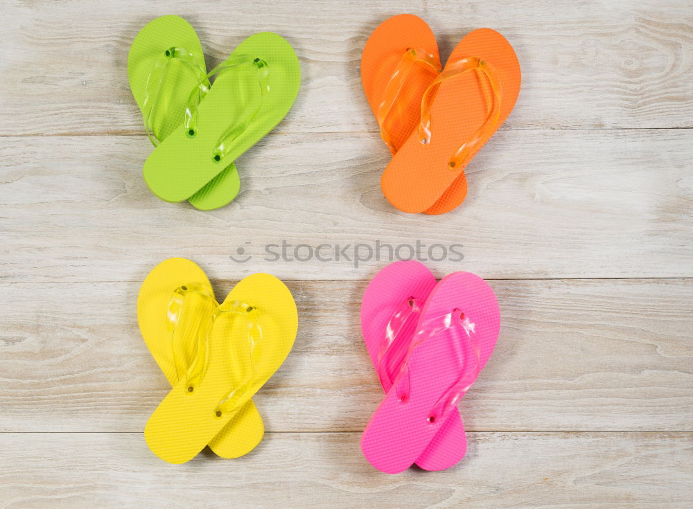 Similar – Row of wellies standing on a wooden porch while raining