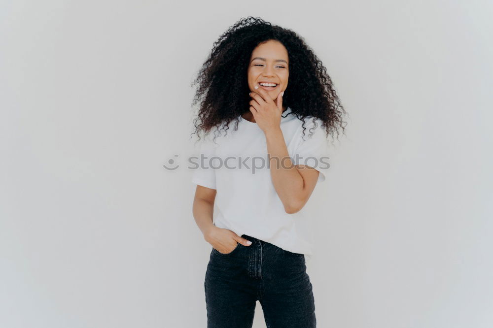 Similar – Young happy woman surrounded by green leaves