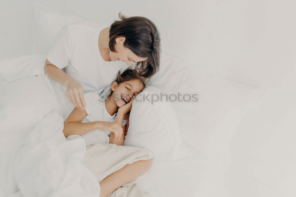 Similar – happy mother hugs her toddler son in the morning