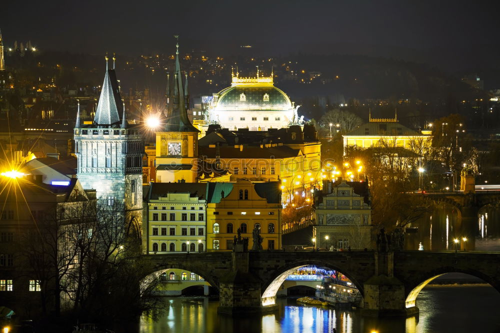 Similar – View of Prague’s old town with many bridges over the Moldau after sunset