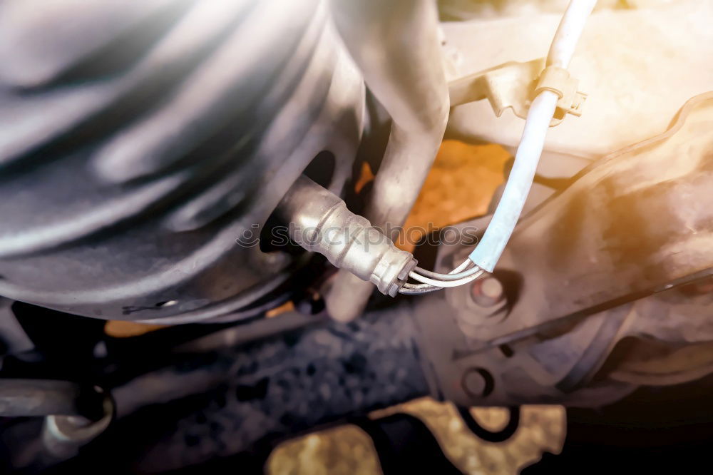 Similar – man’s hands goldsmith work on a piece of silver