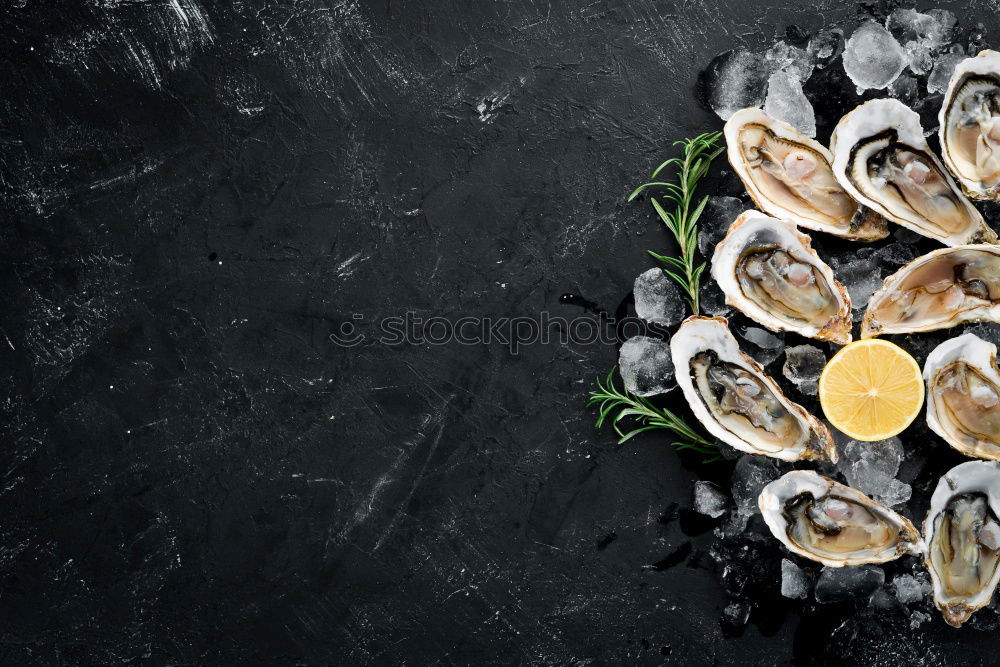 Similar – Oyster platter with lemon and various sauces