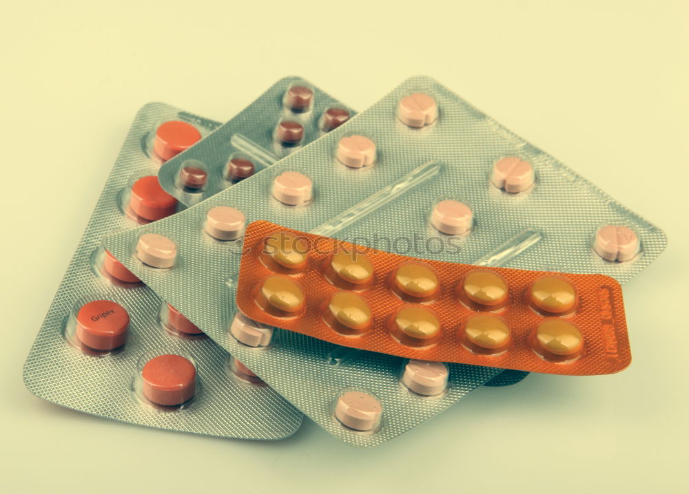 Similar – Pink tablets pill on blur blister pack of tablets pills on pink background. Prescription drugs. Woman health concept. Pharmaceutical industry. Online pharmacy banner. Drugs packaging. Treatment dose.